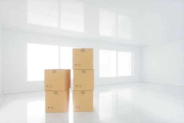Stacked cardboard in the empty room, with sunlight come from the windows, 3d rendering. — Stock Photo, Image