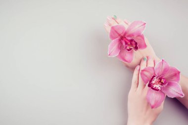 Manicure and flowers. 