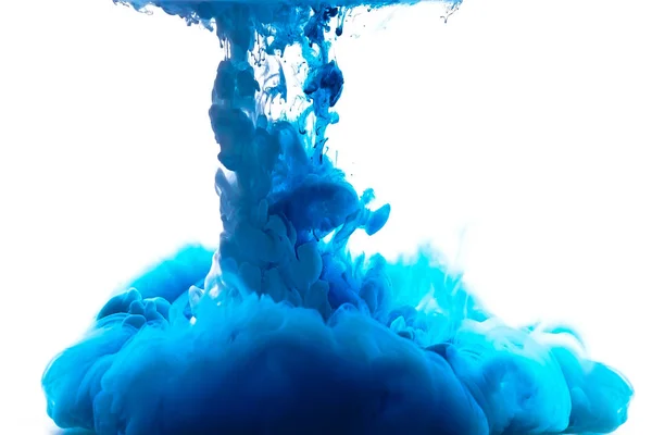 Mångfärgade virvlande droppe bläck i vattnet Stockfoto