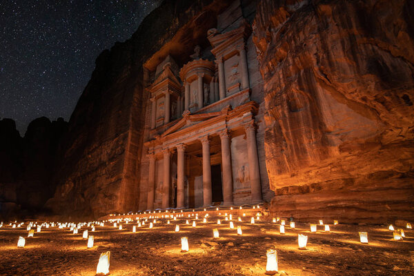 The treasury in Petra, Jordan with beautiful candles and stars.