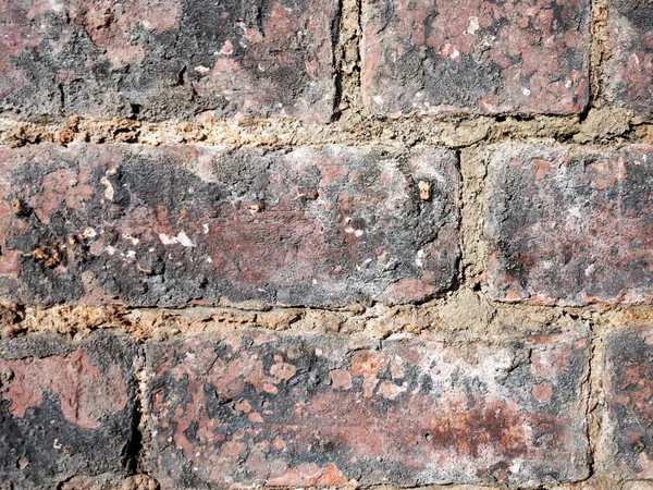 Brick wall background. City wall. Close up.