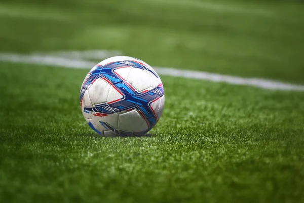 Soccer ball on green grass