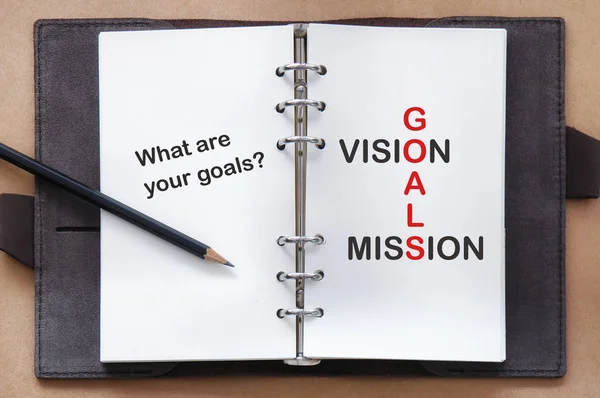 Palavras de objetivos, visão e missão no livro organizador com lápis — Fotografia de Stock