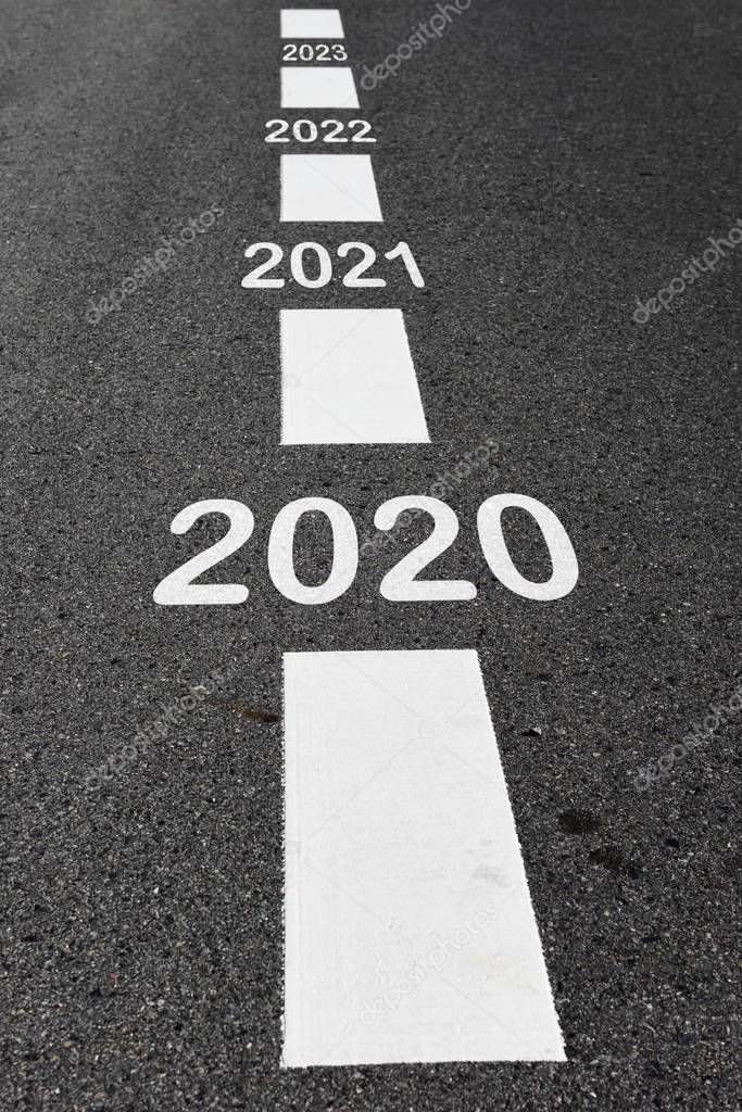 2020 to 2023 on black asphalt road and white marking lines, Happy new year and road to success concept