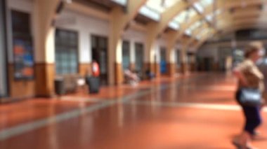 Blur Slow motion video of People passing through Wellington Railway Station, New Zealand