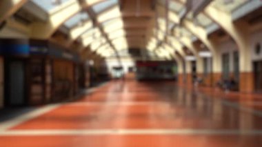 Blur Slow motion video of People passing through Wellington Railway Station, New Zealand