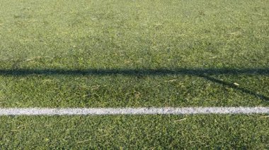 Artificial grass football field; Slow motion