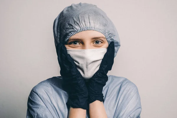 Coronavirus man in medical mask, bathrobe and medical cap