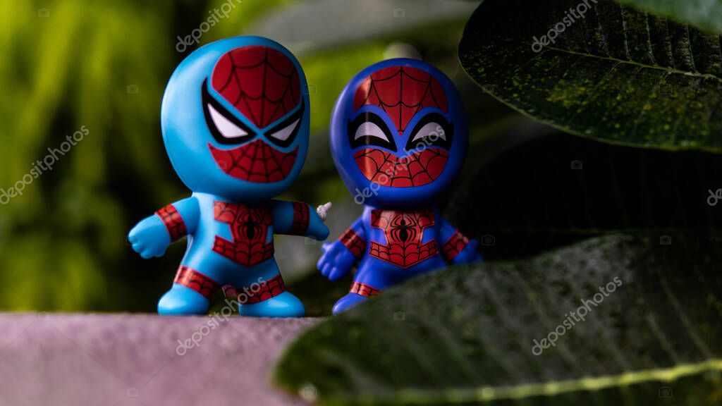 Selangor , Malaysia - March 28, 2019: Two McDonald's toy Spidermans having a conversation planning to do some pranks on the villain.
