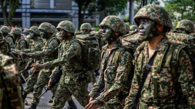 Putrajaya, Malezya - 31 Ağustos 2019: 62. Bağımsızlık Günü veya Putrajaya 'da Malezya' nın Merdeka Günü kutlamalarında yürüyüş birliklerinin yakın görüntüsü.