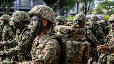 Putrajaya, Malezya - 31 Ağustos 2019: 62. Bağımsızlık Günü veya Putrajaya 'da Malezya' nın Merdeka Günü kutlamalarında yürüyüş birliklerinin yakın görüntüsü.