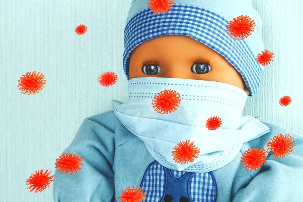 Hračky malý chlapec v lékařské masce a modely viru proti němu. — Stock fotografie
