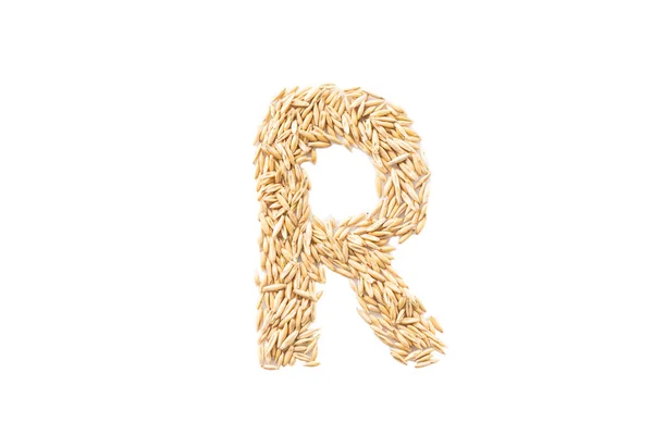 Алфавит на белом фоне. Буквы сделаны из семян овса . — стоковое фото