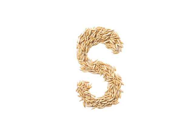 Alphabet on a white background. The letters are made of oat seeds. — Stock Photo, Image