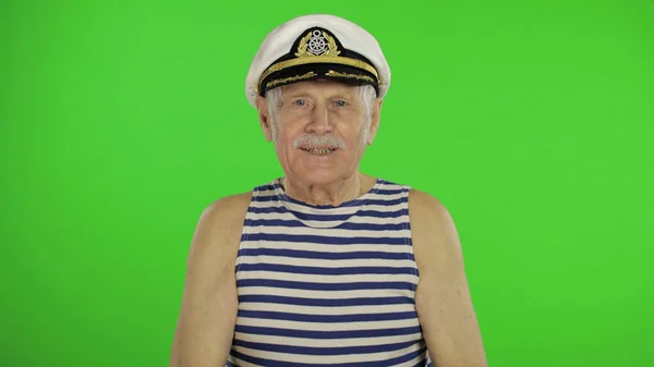 Elderly sailor man with mustache smiling. Old sailorman on chroma key — ストック写真