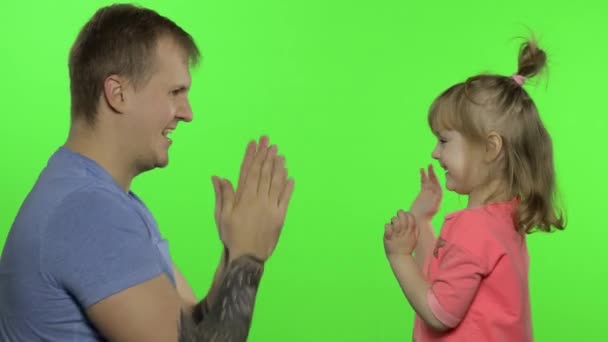 Father and little daughter laughing, playing together. Chroma Key. Leisure games — Stock Video