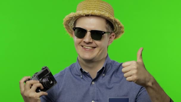 Portrait of young man tourist photographer giving thumbs up. Chroma key — Stock Video