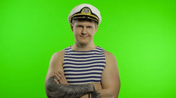 Young sailor man arms crossed, looking at camera. Seaman guy in sailors vest — Stock Photo, Image