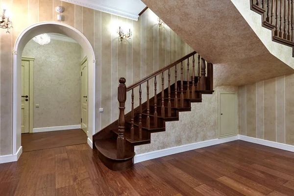 staircase with wrought iron railing