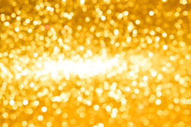 Soyut altın parıltılı arkaplan parıltıları
