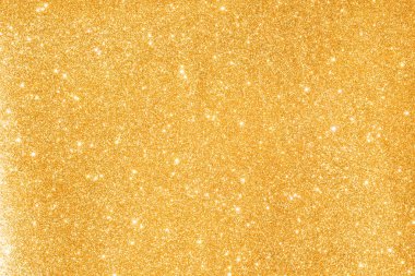 Soyut altın parıltılı arkaplan parıltıları
