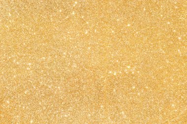 Soyut altın parıltılı arkaplan parıltıları