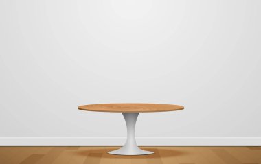 Beyaz stüdyo odasındaki tahta yuvarlak masa.