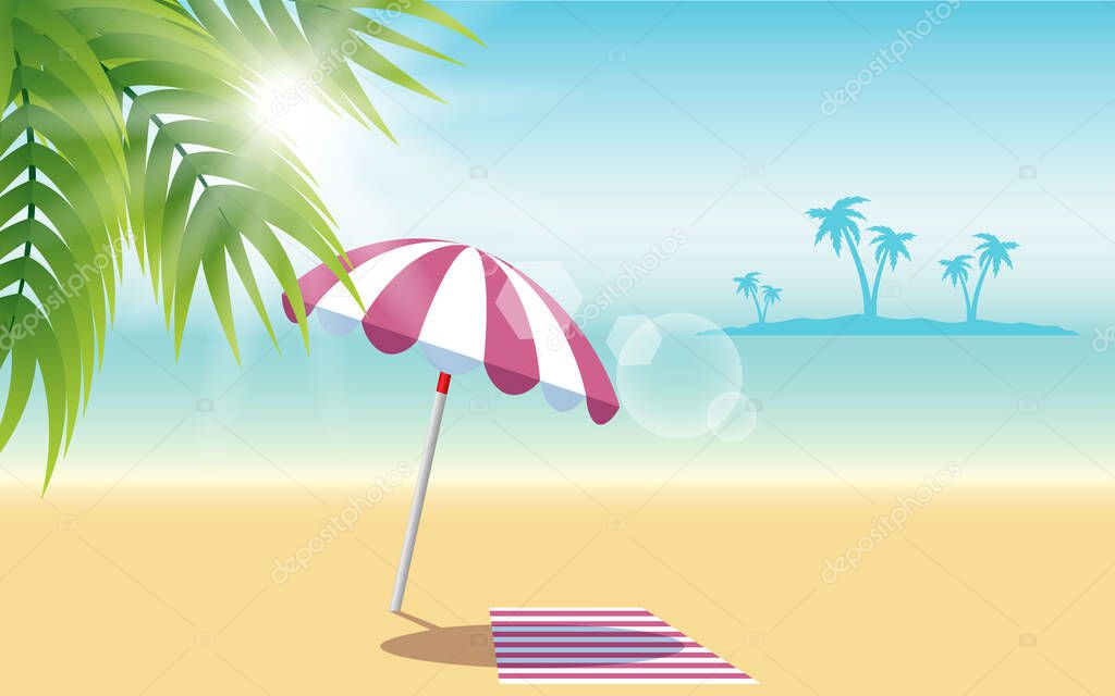 colorful umbrella and beach mat on the beach in summer