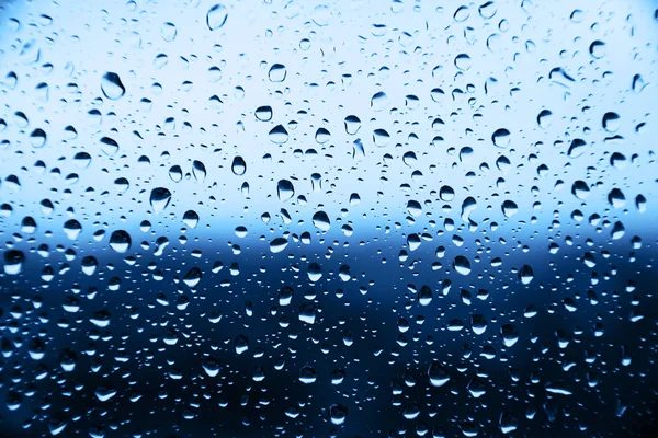 Gotas de chuva em vidro Fotografia De Stock