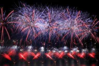 Colorful fireworks explosion, New Year, amazing fireworks isolated in dark background close up with the place for text, Malta fireworks festival in Valletta 2017, Independence day clipart