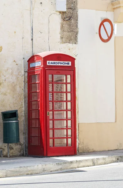 Cardphone, red telephone in the street of Valletta, Malta. Retro cardphone in the street. Valletta, Malta. — Stock Photo, Image