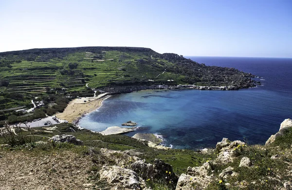 Maltese landscape. Qarraba bay, Malta. Panoramic view of Clay Cliffs with blue sky background. Maltese scenery. Visit Malta