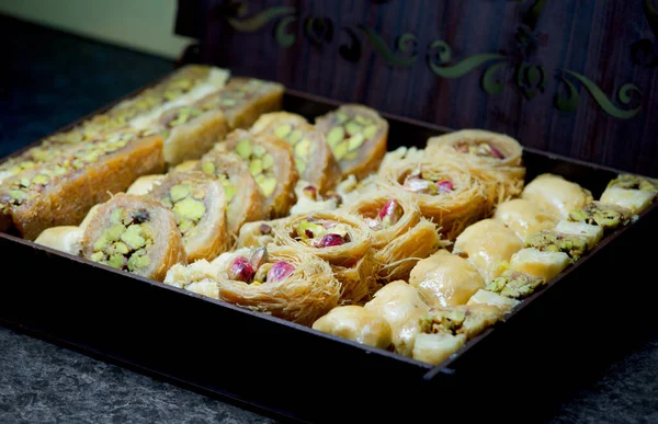 Travel to Middle East country Kingdom of Jordan - traditional arabian sweet pastry baklava close up. Jordan, Middle East cuisine
