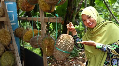 Seller of durian fruit when peddling its product, Batang Indonesia, 31 January 2020
