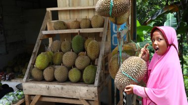 Seller of durian fruit when peddling its product, Batang Indonesia, 31 January 2020
