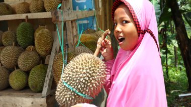Seller of durian fruit when peddling its product, Batang Indonesia, 31 January 2020