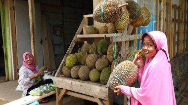 Seller of durian fruit when peddling its product, Batang Indonesia, 31 January 2020
