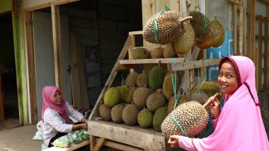 Seller of durian fruit when peddling its product, Batang Indonesia, 31 January 2020