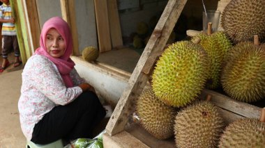 Seller of durian fruit when peddling its product, Batang Indonesia, 31 January 2020