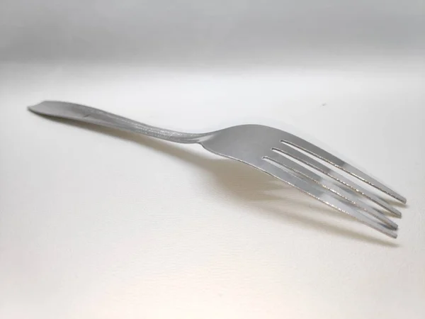 Πιρούνι Τρώει Λευκό Φόντο Αφηρημένη Φόντο Μονόχρωμη Υφή Εικόνα Περιλαμβάνει — Φωτογραφία Αρχείου
