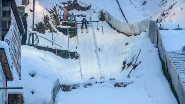 Young Ski Jumper Jumps Elegantly Lands Ground Nice Snowy Day — Stock Video