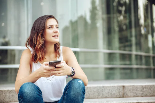 Young Woman with smartphone — Stock Photo, Image