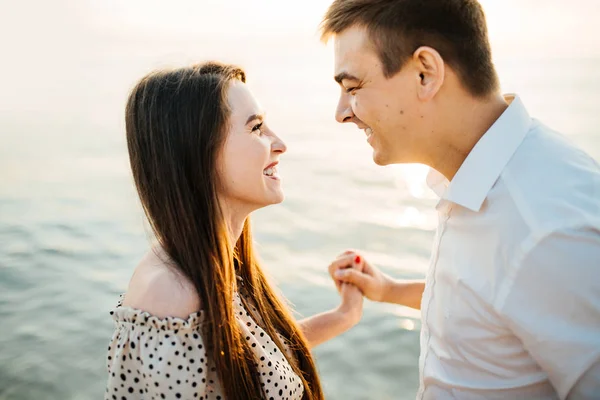 Closeup photo of young loving couple laughing. — Stock Photo, Image