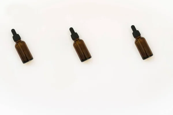 Glass bottles pattern isolated on white background.