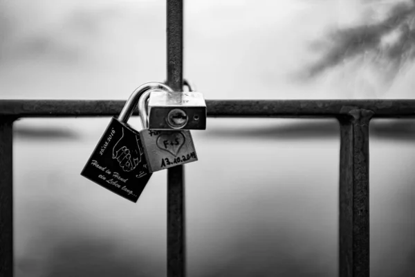 Three padlocks are engraved on the name, hang together on a stai — Stock Photo, Image