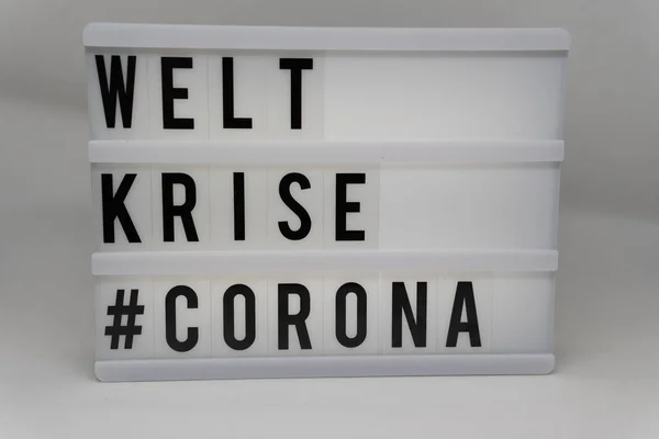 Светлая Коробка Надписью Welt Krise Corona Белом Фоне — стоковое фото