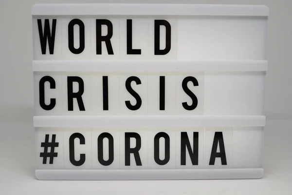 Светлая Коробка Надписью World Crisis Corona Белом Фоне — стоковое фото