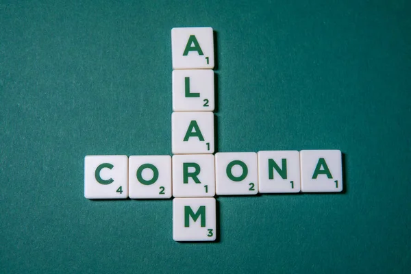 Green Base Game Pieces Letters Form Words Corona Alarm — Stock Photo, Image