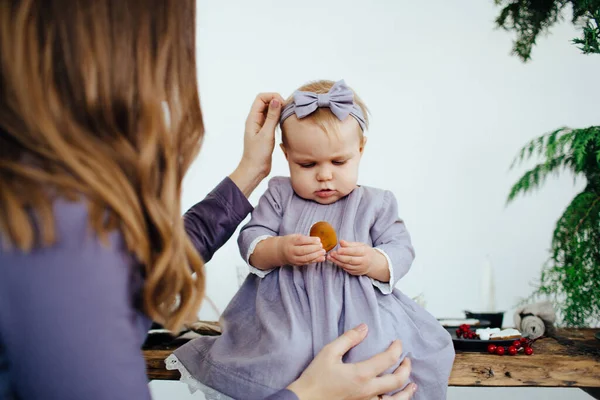 Little baby girl in a blue dress. Happy childhood. — Stock Fotó