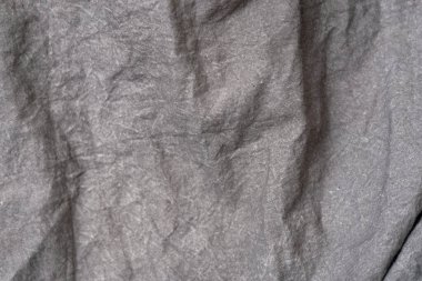 Buruşuk kumaş dokusu, koyu gri kumaş arkaplan